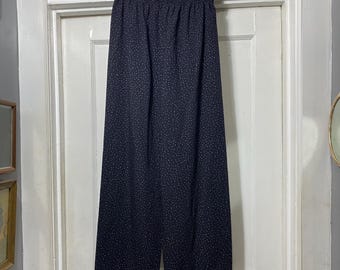 Pantaloni vintage neri a vita alta con pois su tutta la superficie