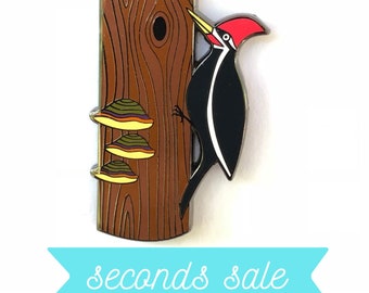 Giving Tuesday SECONDS SALE! Pileated Woodpecker hard enamel pin. Woodpecker on a tree with shelf mushrooms pin. Designed by Forage Workshop