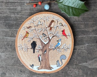 Snowy tree full of winter backyard birds. Wood slice art, small wall hanging. Handmade by Forage Workshop. PREORDER