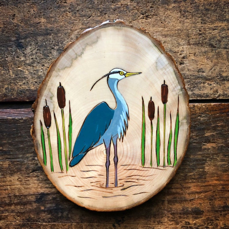 Great blue heron wood burned and painted on wood slice Bird ornament.
