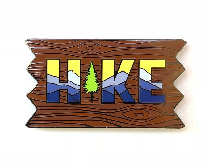 Hike sign hard enamel pin. Hikers mountain and tree pin. Nature lover outdoorsy gift. Backpacker gift. Created by Forage Workshop