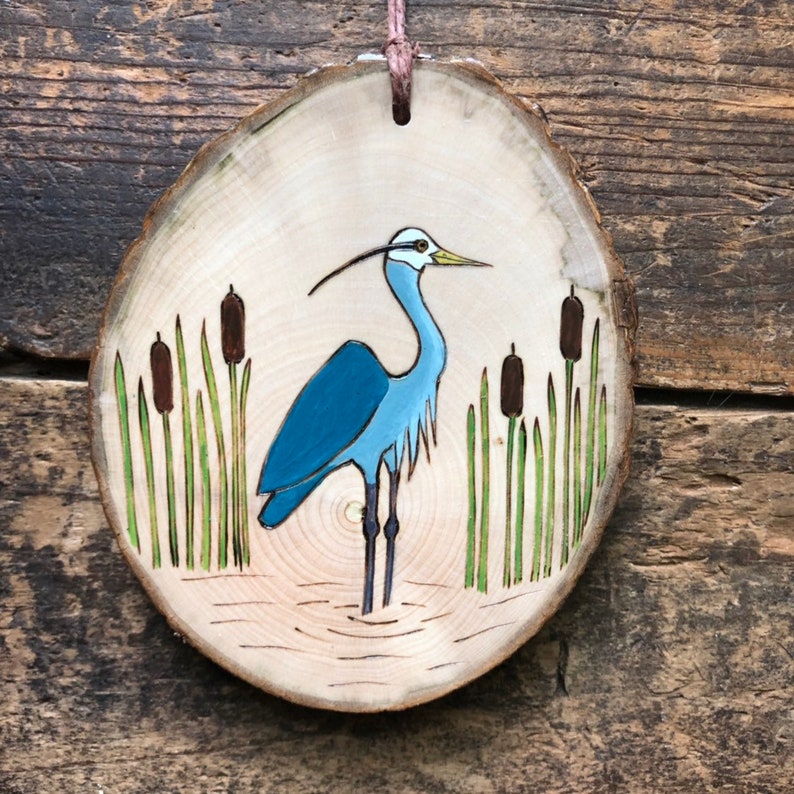 Great blue heron wood burned and painted on wood slice Bird ornament.