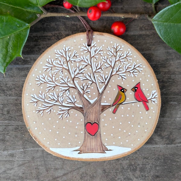 Snowy, winter tree with red cardinal couple and heart. Custom made, personalized wood slice ornament. Handmade by Forage Workshop PREORDER