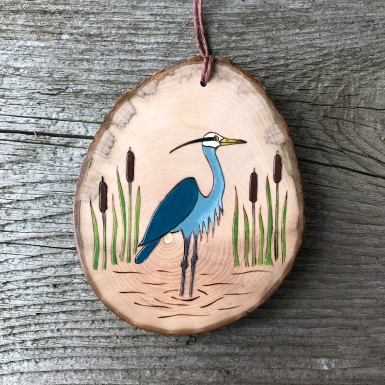 Great blue heron wood burned and painted on wood slice Bird ornament.