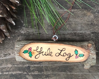 Wood burned and hand painted Yule log ornament by Forage Workshop