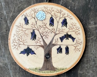 Black bats hanging in a spooky tree with full moon. Wood slice art handmade by Forage Workshop PREORDER