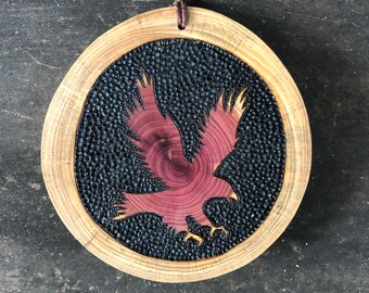 Eagle ornament. Cedar wood slice ornament with wood burned bald eagle silhouette.  Claw prints on ornament back. Handmade by Forage Workshop