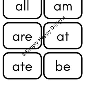May include: Six white rectangular cards with rounded corners, each containing a single word in black font: "all", "am", "are", "at", "ate", and "be". The cards are arranged in two rows of three.
