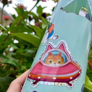 Cute Orange UFO Cat Glitter Vinyl Glossy Sticker, Cute Ginger Kitty Cat in Cat Flying Saucer Shiny Rainbow Sticker image 3
