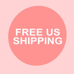 May include: A pink circle with the text "FREE US SHIPPING" in white.