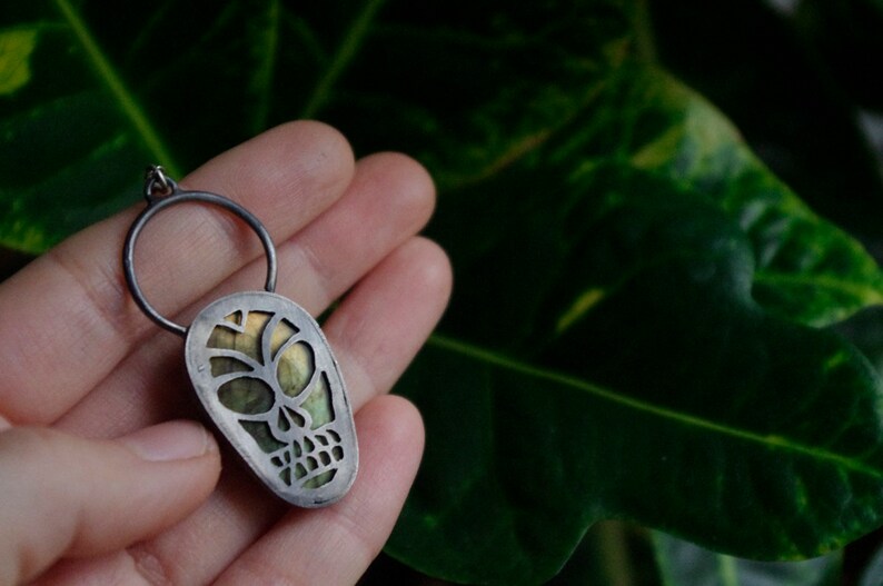 Labradorite skull in sterling silver necklace pendant goth gothic witchy santa muerte green stone natural ooak carved