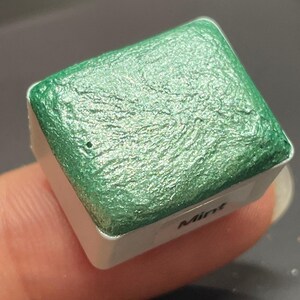 Mint teal watercolor paints half pan