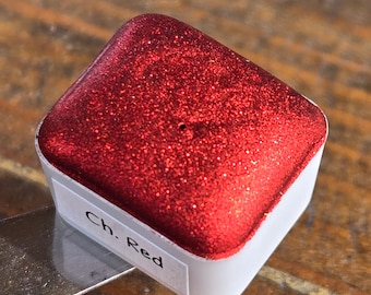 Media pastilla de pintura acuarela roja navideña cromada