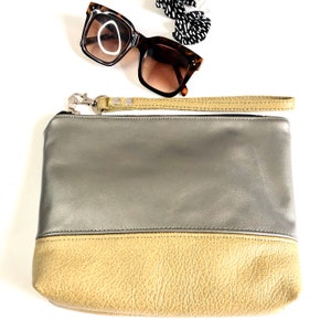 Bolso de mano tipo clutch/cartera mediana