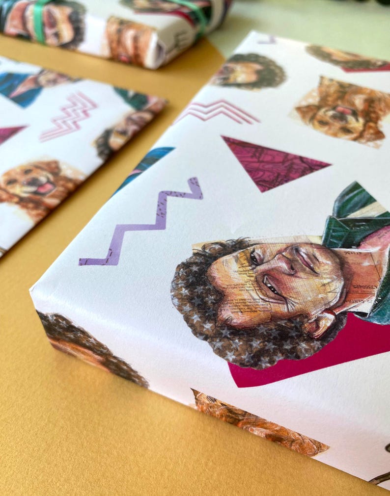 May include: White wrapping paper with a repeating pattern of a person's face and a dog's face, along with purple zigzags and pink triangles. The wrapping paper is used to wrap gifts.