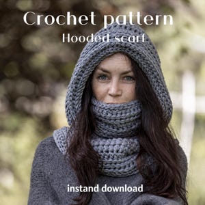 May include: A grey crochet hooded scarf with a thick, textured yarn construction. The text "Crochet pattern", "Hooded scarf", and "instand download" are visible on the image. The scarf features a deep hood and a wrap-around neck section.