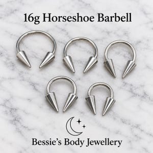May include: Five silver-toned 16g horseshoe barbells with pointed cone ends. The text 16g Horseshoe Barbell is at the top, and the text Bessie's Body Jewellery with a crescent moon and star icon is at the bottom of the image.