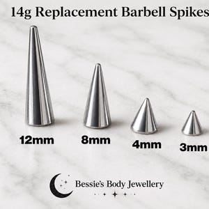 Op de afbeelding: Vier zilverkleurige 14g vervangende barbell-punten in verschillende hoogtes. De punten zijn gelabeld met 12mm, 8mm, 4mm en 3mm. De tekst 14g Replacement Barbell Spikes en het logo van Bessie's Body Jewellery zijn in de afbeelding zichtbaar.