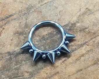Blue 16g titanium hinged clickers, spiked hinged clicker, 1.2mm hinged clicker, silver hinged clicker, septum ring, spiked septum ring