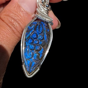 Blue Labradorite carved flower pendant in silver