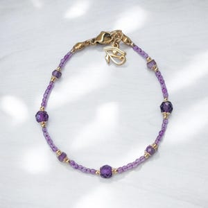 Bracciale in oro con ametista e occhio di Horus
