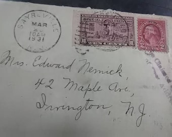 10 cent special delivery and 2 cent Washington stamp on 1931 envelope