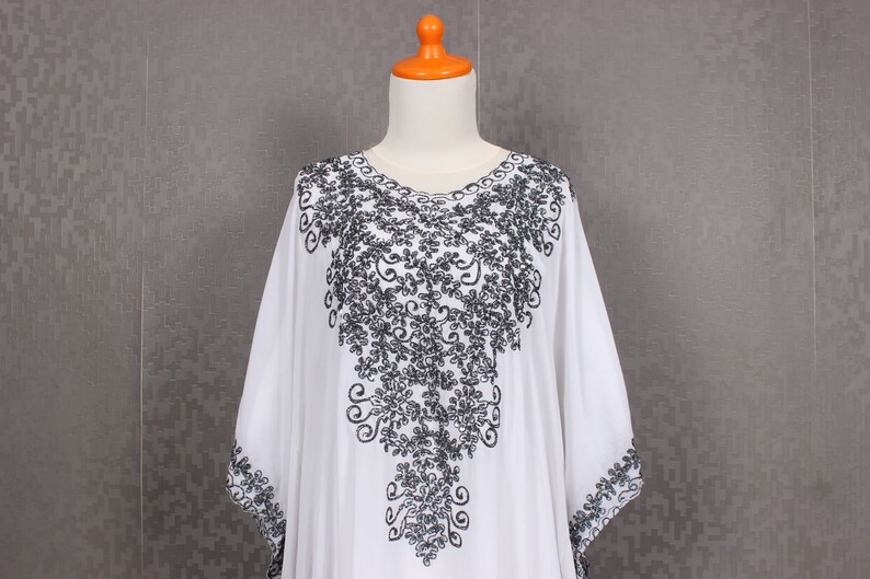 white and silver kaftan