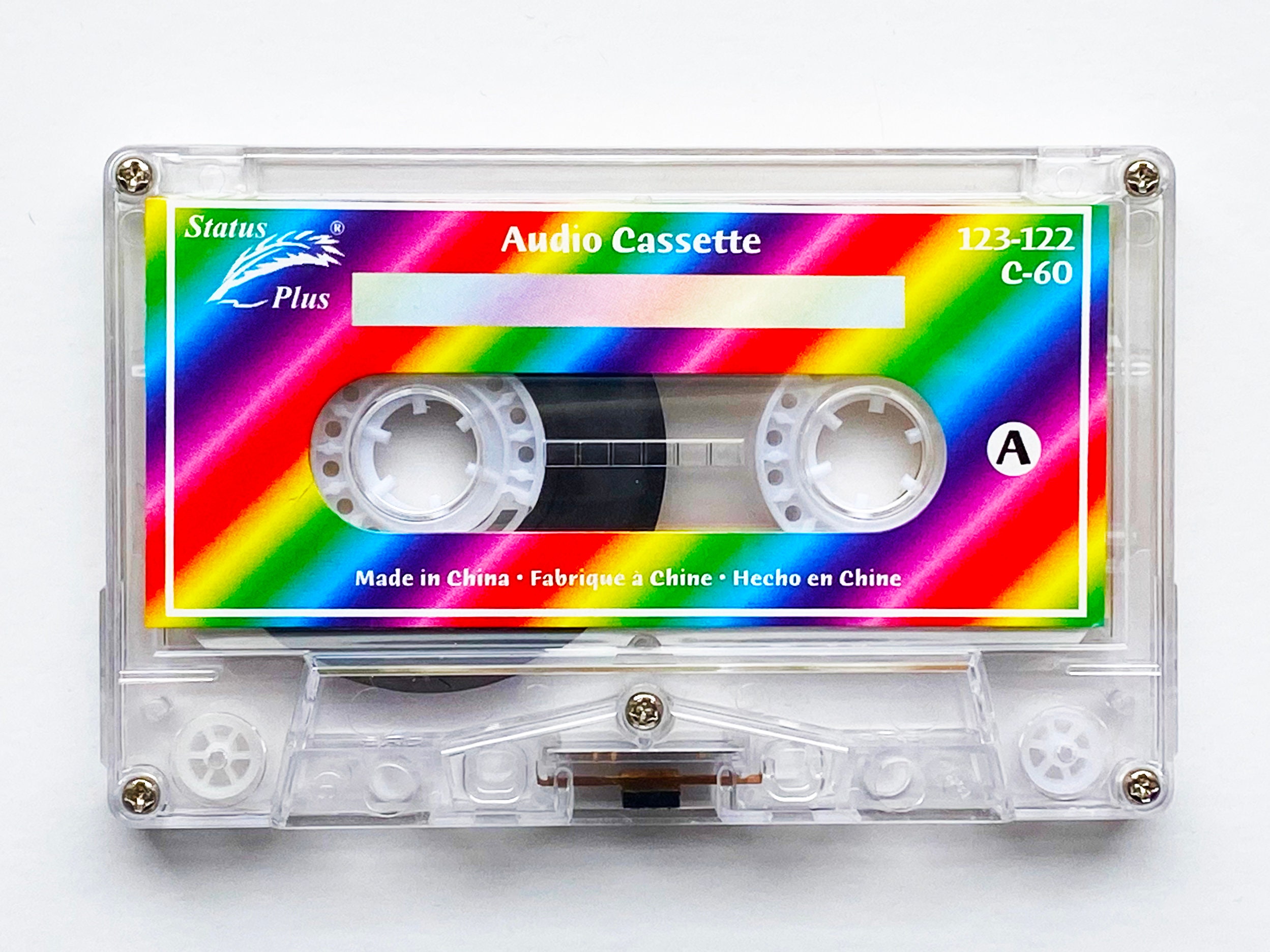 Premium Photo | Colored Audio Cassettes Hanging In The Air Against Purple - Foto 10