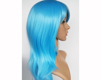 Light blue long wavy wig. Sky blue high quality synthetic hair. Party costume blue long wig for women. Free shipping in US. Ready to ship.