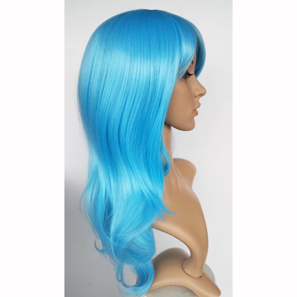 Light blue long wavy wig. Sky blue high quality synthetic hair. Party costume blue long wig for women. Free shipping in US. Ready to ship.