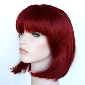 Dark Red bob wig with bangs for women. High quality synthetic hair. Premium natural looking deep red wig. Free shipping USA. Ready to ship.