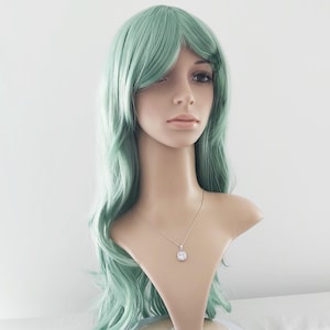 Long wavy light green wig for women. Party costume jade green wavy wig. High quality synthetic green hair. Ready to ship. Free US shipping.