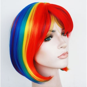Vibrant rainbow bob wig with bangs for women. Premium natural looking bob wig. High quality synthetic hair. Ready to ship.