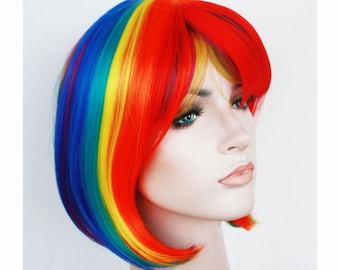 Beautiful rainbow bob wig with bangs for women. Holiday party rainbow wig. High quality synthetic hair. Free shipping in US. Ready to ship