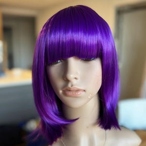 Purple  bob wig with bangs for women. High quality synthetic short straight hair. Daily wear purple wig. Free shipping in US. Ready to ship.