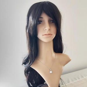 Black long wavy wig for women. Smooth daily wearing black long hair. High quality synthetic long hair. Ready to ship. Free US shipping.