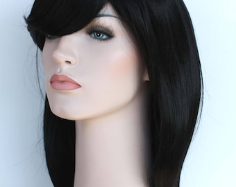 Black long wavy wig for women. Synthetic high quality daily wear long hair. Free shipping in US. ready to ship. Express shipping available.