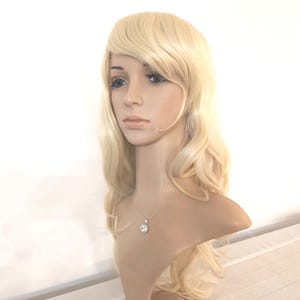 Blonde curly long wig for women. Holiday party costume wig. Daily wearing heat resistant synthetic hair. Ready to ship. Free US shipping.