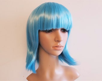 Aqua blue bob wig for women. Sky blue women's costume wig with bangs. High quality synthetic hair. Ready to ship. Free shipping in USA.