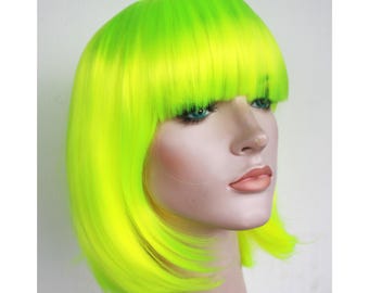 Peluca bob verde neón con flequillo: cabello sintético resistente al calor.