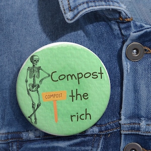 May include: A round button with a green background and the words "Compost the rich." A skeleton graphic leans against a sign that says "Compost."