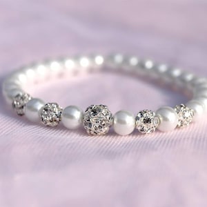 Bridal bracelet wedding bracelet - swarovski crystal rhinestone - pearls - ivory or white glass - elastic bracelet-