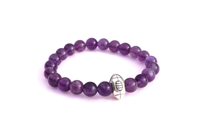 Rugby ball on elastic Clearance