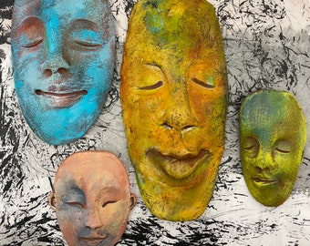 Colorful Ceramic Face Sculptures. Happy Pottery Wall Accents.