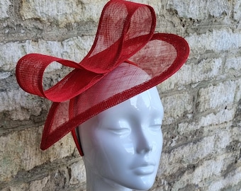 Red fascinator hat for weddings or church in poppy red teardrop shape with bow decoration on headband