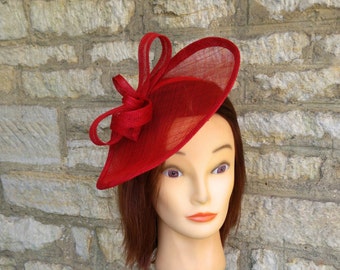 Red fascinator wedding hat on headband one off design in sinamay straw