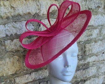 Hot pink fascinator hat for wedding in fuchsia pink hat on headband