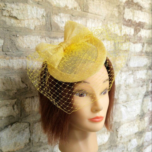 Yellow fascinator hat for wedding or tea party