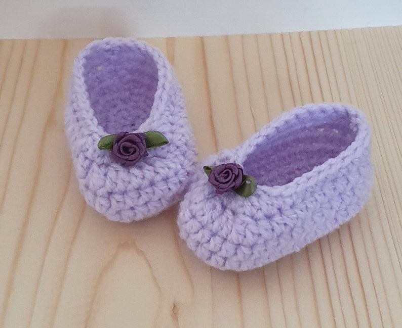 Baby girls crochet ballet shoes. Crochet Baby shoes. Pram shoes. Size 0-3 months . Other colours listed Lilac + purple rose