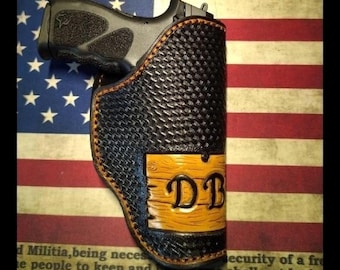 Custom made, Hand Tooled Holster for Medium Automatics.